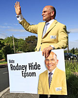 Rodney Hide's yellow jacket carries a slogan, but no authorisation signature. Photo / Martin Sykes
